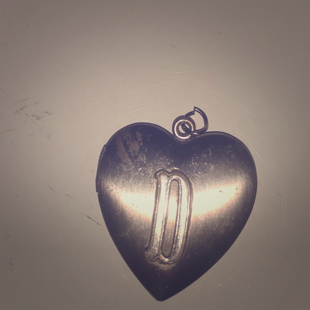 Vintage locket with a D on it